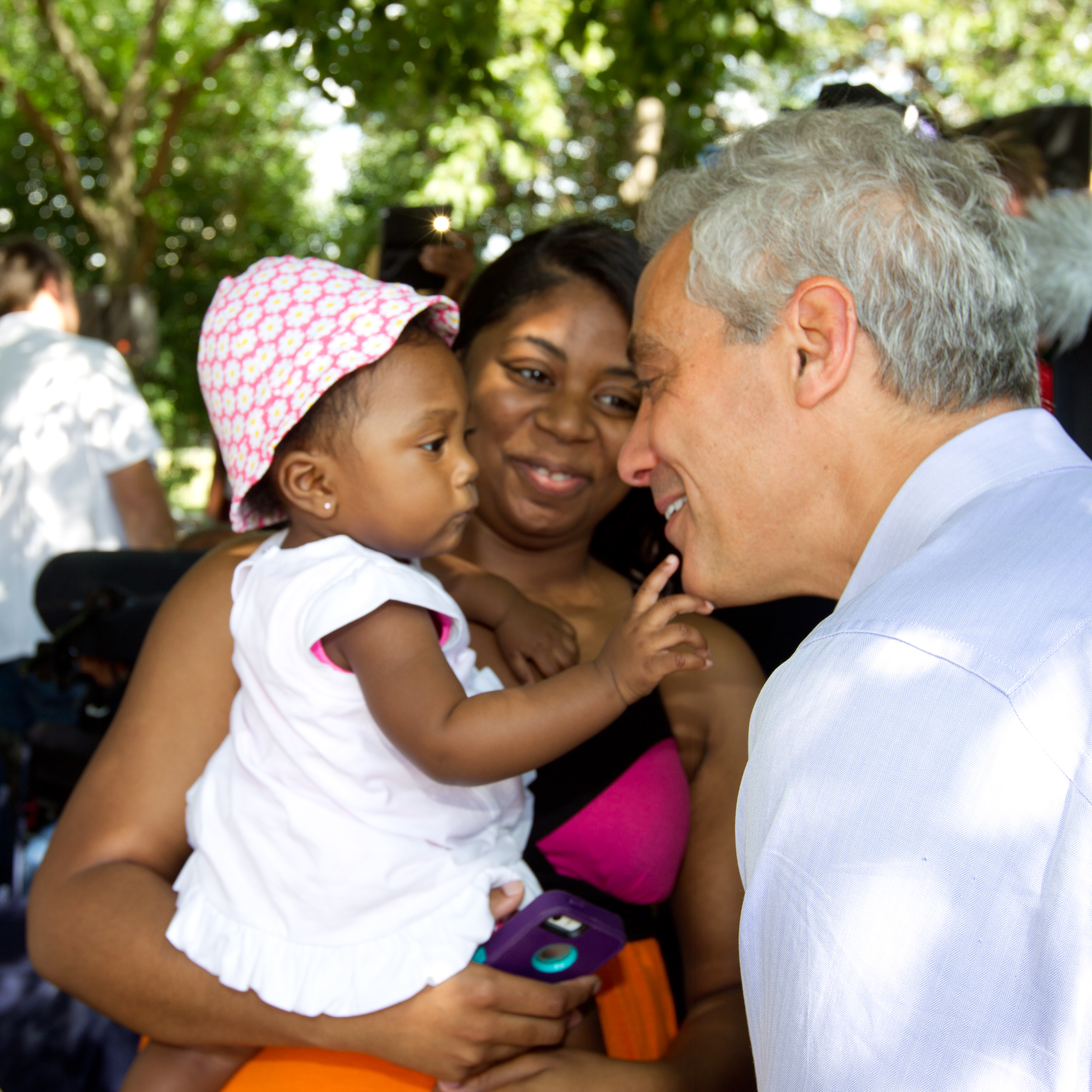 Mayor Emanuel joins Bronzeville community members as they cerebrate the opening of a new playground at Anderson Park.